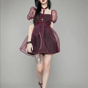 Widow puffed sleeve dress with harness.